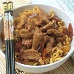 Noodles con pollo in agrodolce